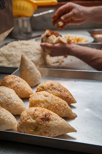 istock The making of sicilian arancini 543320362