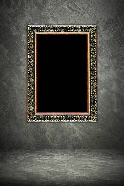 istock antique wooden frame on cement background 543323530