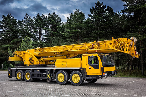 istock Yellow mobile crane in road construction 543330066