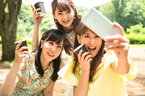 istock japanese friends take a selfie 543332082
