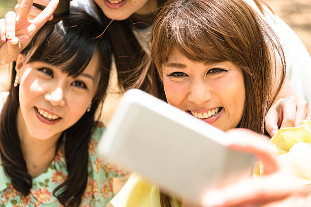 istock japanese friends take a selfie 543332260