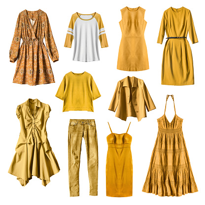 Set of yellow female clothes on white background