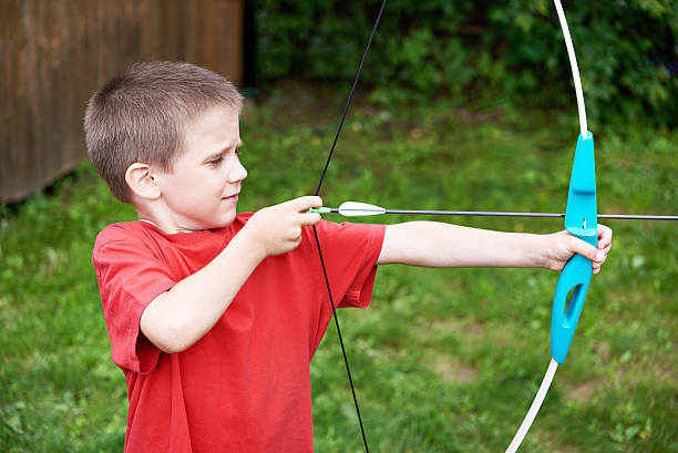 istock Little archer with bow and arrow 543334022