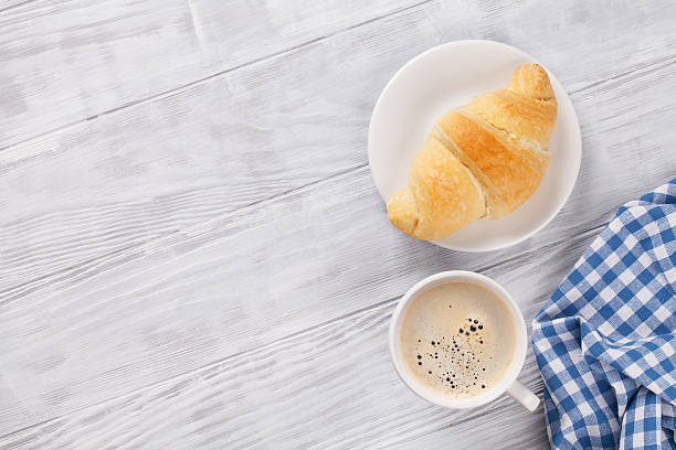 istock Fresh croissant and coffee 543334474