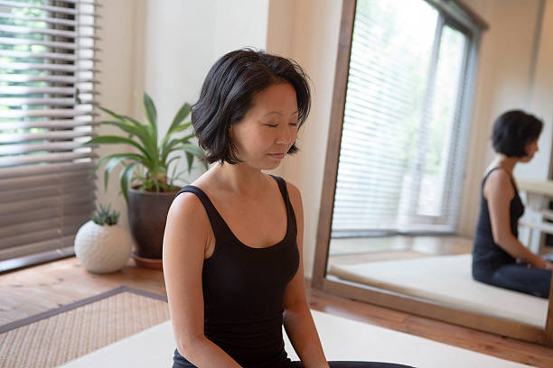 istock japanese female doing physical relaxation exercise in kyoto japan 543336740