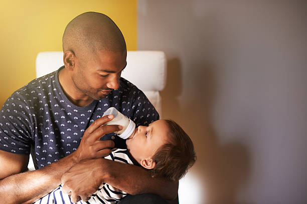 istock Safe and content in her father's arms 543337910