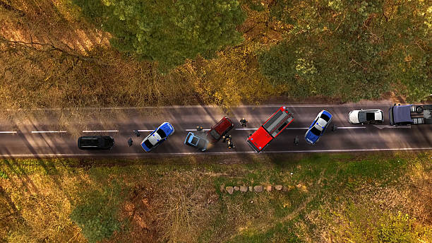Traffic accident with vehicles on a highway aerial view stock photo