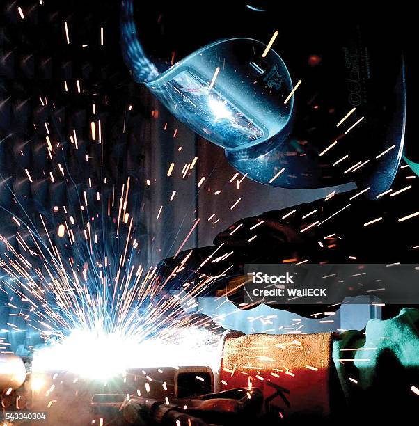 Spark Of Weld Stock Photo - Download Image Now - Adult, Blue-collar Worker, Business Finance and Industry