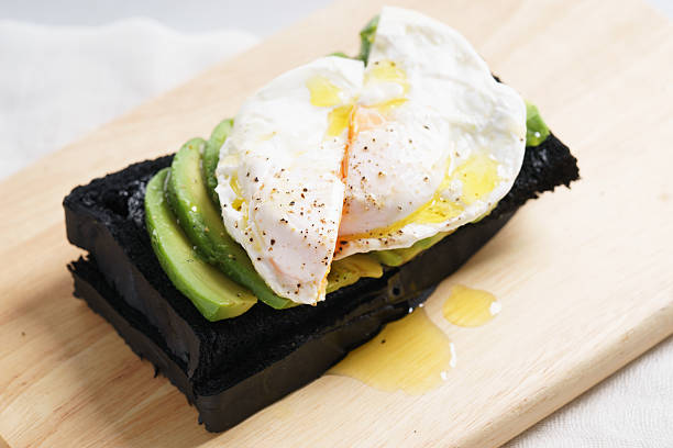 egg and avocado charcoal bread toast