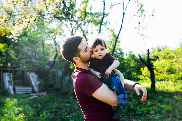 istock young family with a child on the nature 543343984