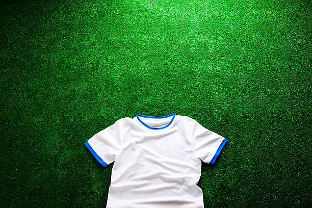 istock Sports t-shirt against artificial turf. Studio shot. Copy space. 543344020