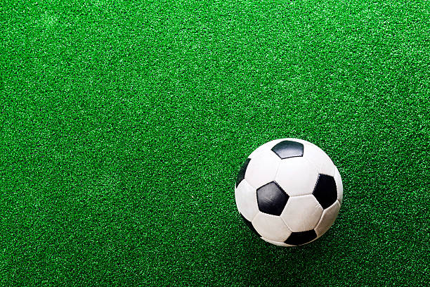 istock Soccer ball against artificial turf. Studio shot. Copy space. 543345022