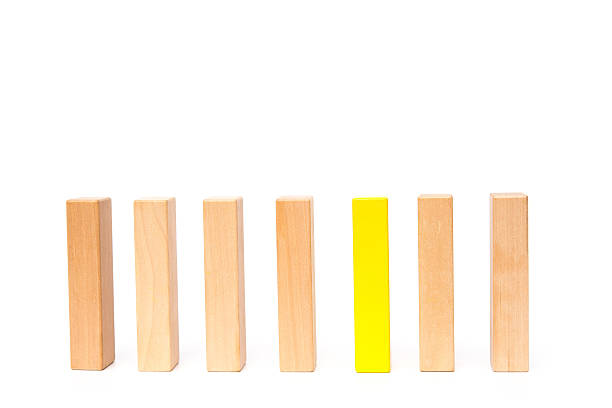 istock line of wooden toy blocks on white background 543346584