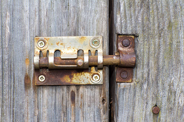 steel lock of iron corroded by rust. very old. strong - detent imagens e fotografias de stock