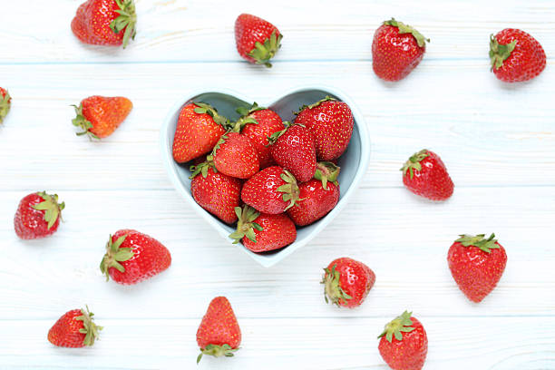 istock Fresh and tasty strawberries in bowl 543349718