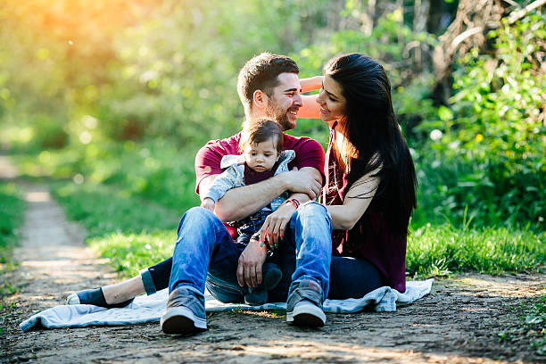 istock young family with a child on the nature 543349822