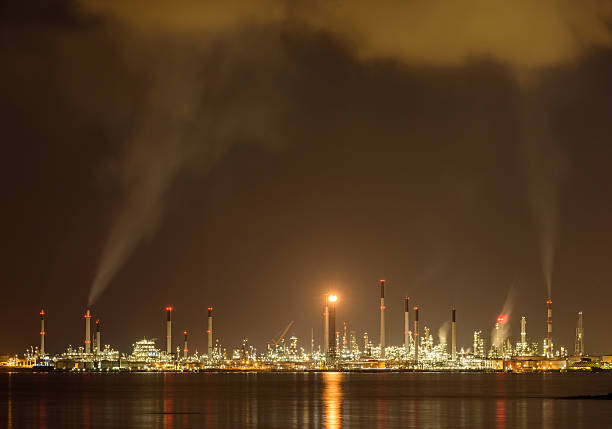 istock Oil refinery at night 543351104