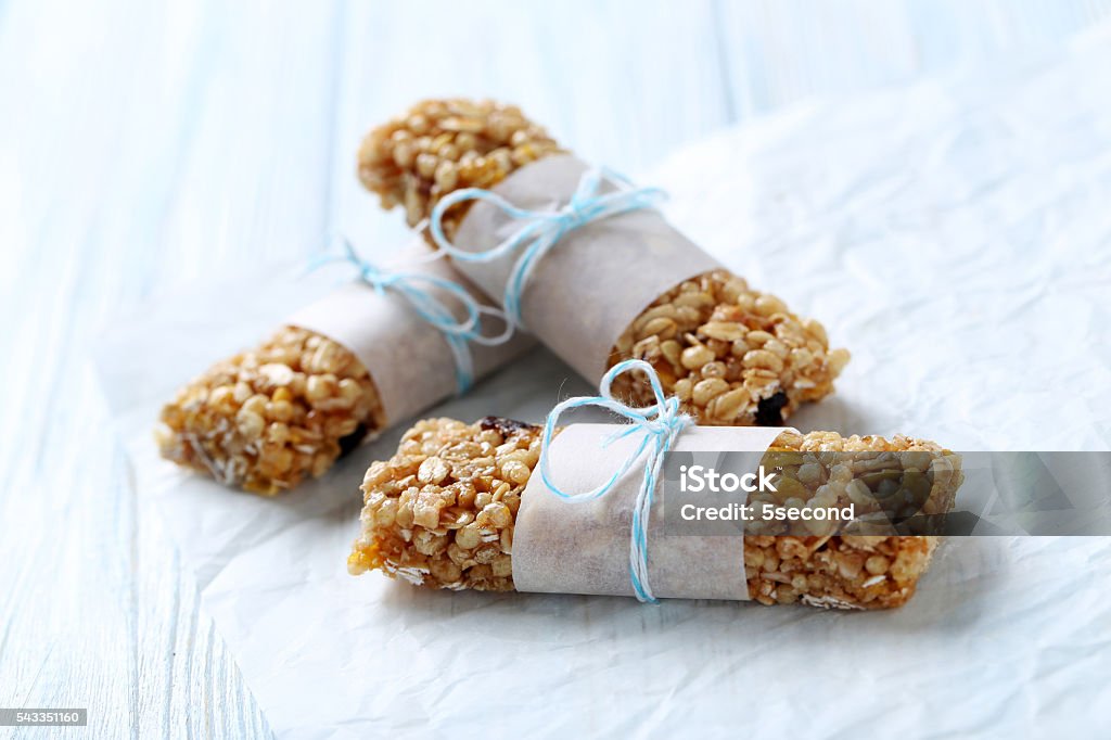 Granola bar on a blue wooden table Breakfast Cereal Stock Photo