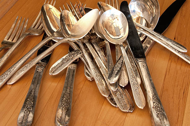 istock Pile of Vintage Wilverware on old kitchen table, full frame 543351688