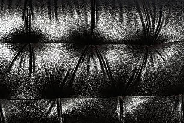 Black leather sofa stock photo