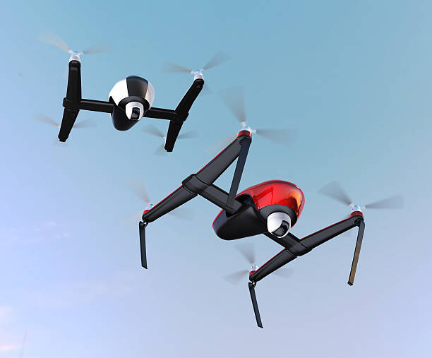 istock Drones in the sky, red one prepare to landing 543353264