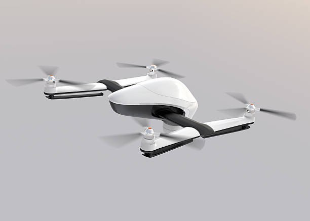 istock White drone flying in the cloudy sky 543353774