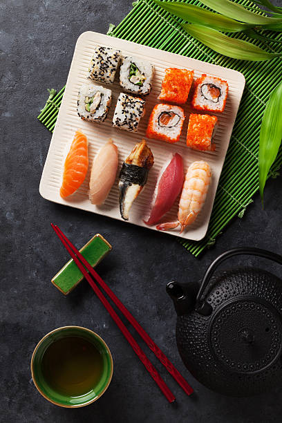 istock Set of sushi, maki and green tea 543354228