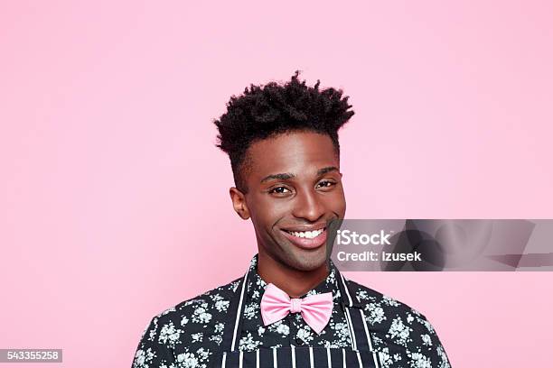 Friendly Afro American Coffee Shop Owner Stock Photo - Download Image Now - Colored Background, Apron, Owner
