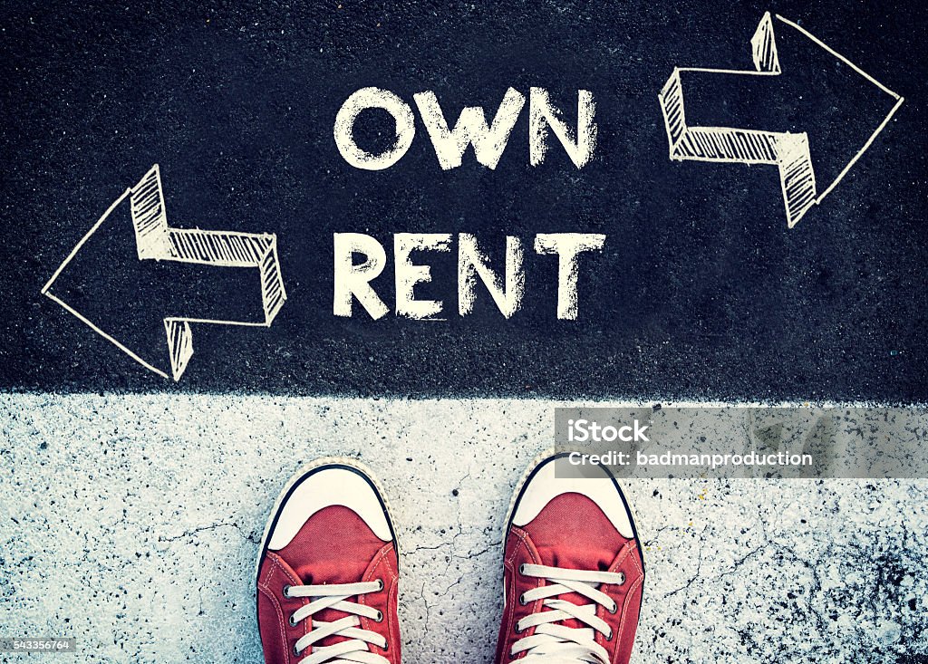 Own and rent Student standing above the sign for own and rent,dilemma concept Buying Stock Photo