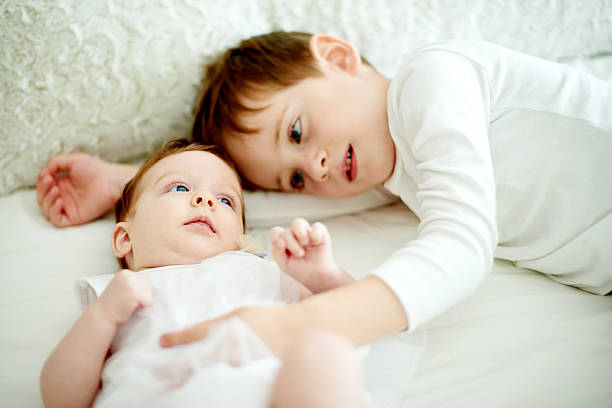 istock Shh, big brother is here 543356866