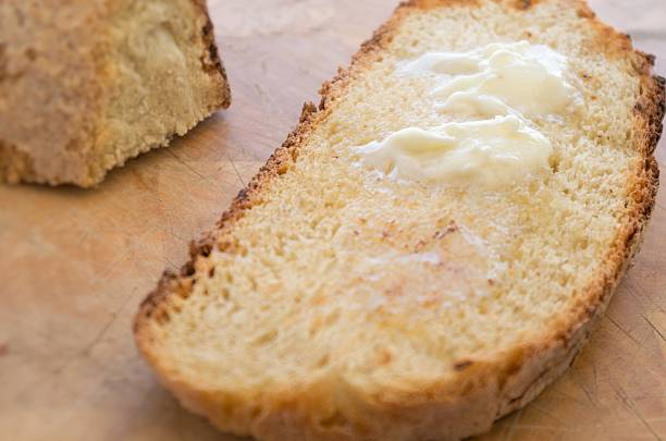 istock Melting butter on a slice of rustic toasted bread 543357906