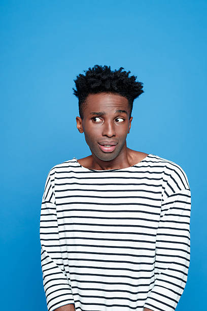 istock Portrait of surprised afro american guy 543358980