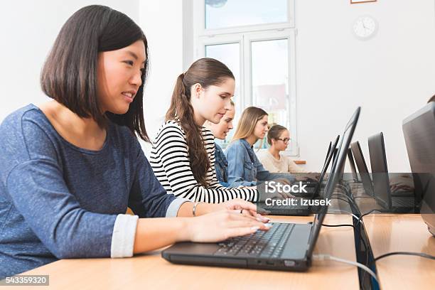 Female Students Learning Computer Programming Stock Photo - Download Image Now - Achievement, Adult, Asian and Indian Ethnicities
