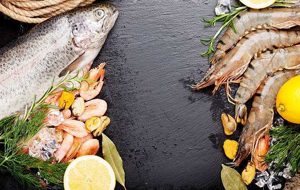 istock Fresh raw sea food with spices 543359954