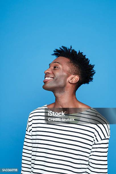 Happy Afro American Guy Stock Photo - Download Image Now - Human Face, Side View, Blue Background