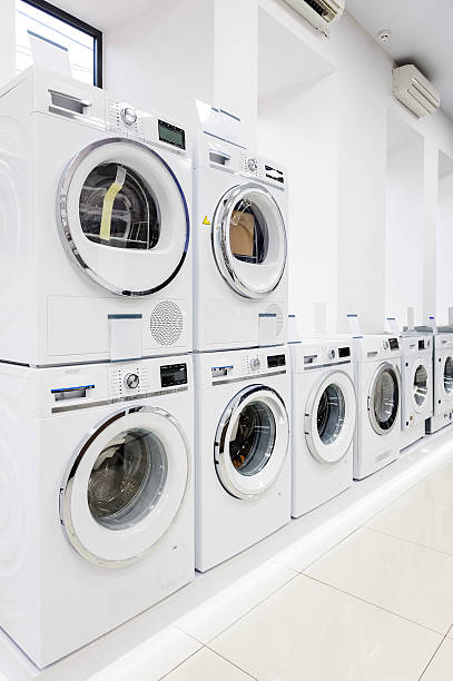 istock washing mashines in appliance store 543360762
