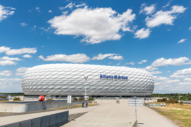 Allianz Arena Munich, Germany - July 30, 2015: Landscape of the football stadium Allianz Arena on July 30, 2015 in Munich, Germany. Arena designed by Herzog & de Meuron and ArupSport and built between 2002 and 2005. allianz arena stock pictures, royalty-free photos & images