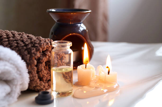 istock Spa set with essential oils, towel and aromatic candles 543361620