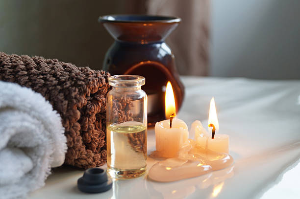istock Spa set with essential oils, towel and aromatic candles 543361690