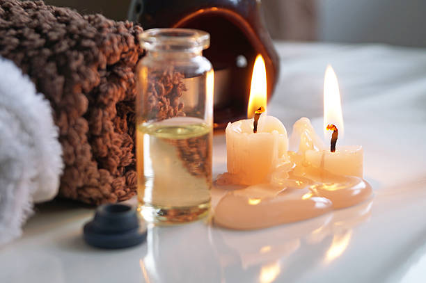 istock Spa set with essential oils, towel and aromatic candles 543361772