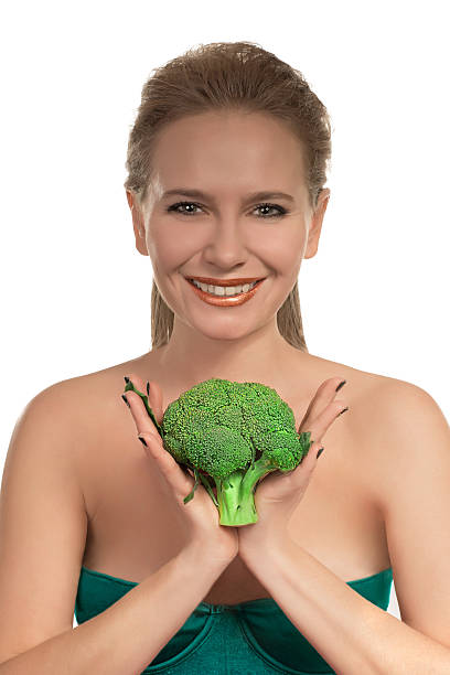 istock the woman with broccoli vegetable 543362260