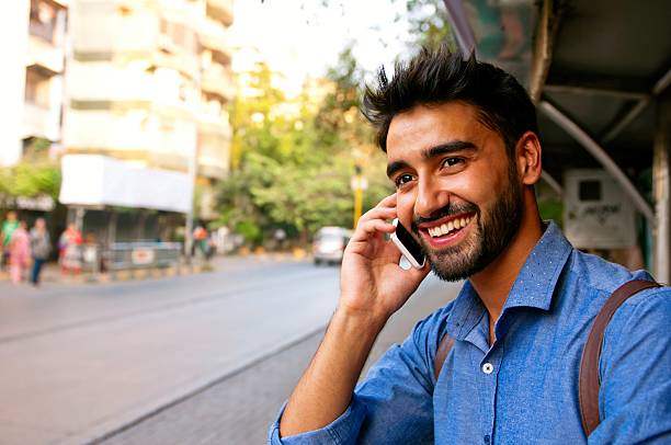 istock Smiling man talking on mobile phone. 543362300
