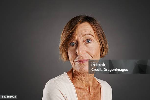 Aged Woman Stock Photo - Download Image Now - 50-59 Years, One Woman Only, Portrait