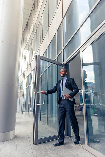 istock Afro American businessman with gadget 543363252