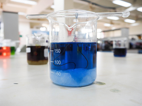 Crystallization Chemical laboratory in blue solution