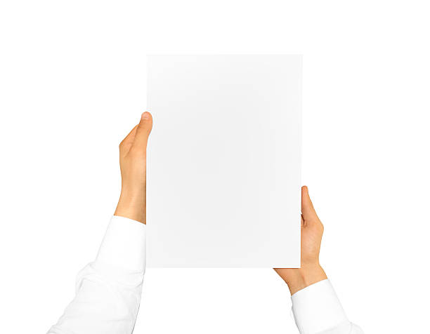 istock Hand holding blank paper sheet. Corporate letterhead 543443092