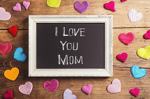 istock Mothers day composition, fabric hearts. Studio shot, wooden back 543443122