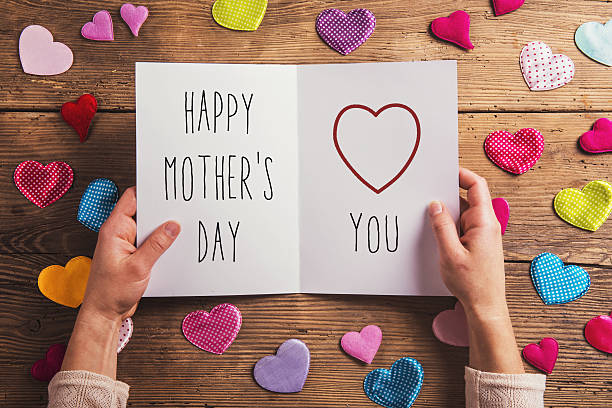 istock Mothers day composition, fabric hearts. Studio shot, wooden back 543443244