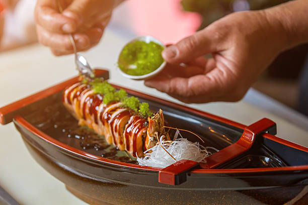 istock Sushi rolls and white noodles. 543446342