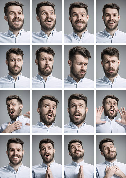 istock Set of young man's portraits with different emotions 543448176